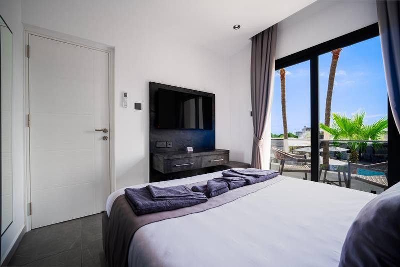Two Bedroom Family Room with Private Balcony, Mountain & Sea View