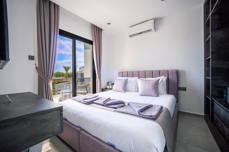 Two Bedroom Family Room with Private Balcony, Mountain & Sea View